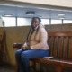 Can Cleveland reduce harm eviction does to Black families: Black woman in jacket sits on bench