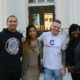 gun violence: 2 men and 2 women, all smiling, stand in front of building.