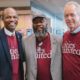 3 smiling men pose wearing maroon Cities United T-shirts