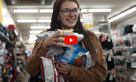 Homeless New Mexico youth: Young lady with long, dark hair wearing glasses