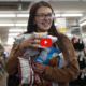 Homeless New Mexico youth: Young lady with long, dark hair wearing glasses