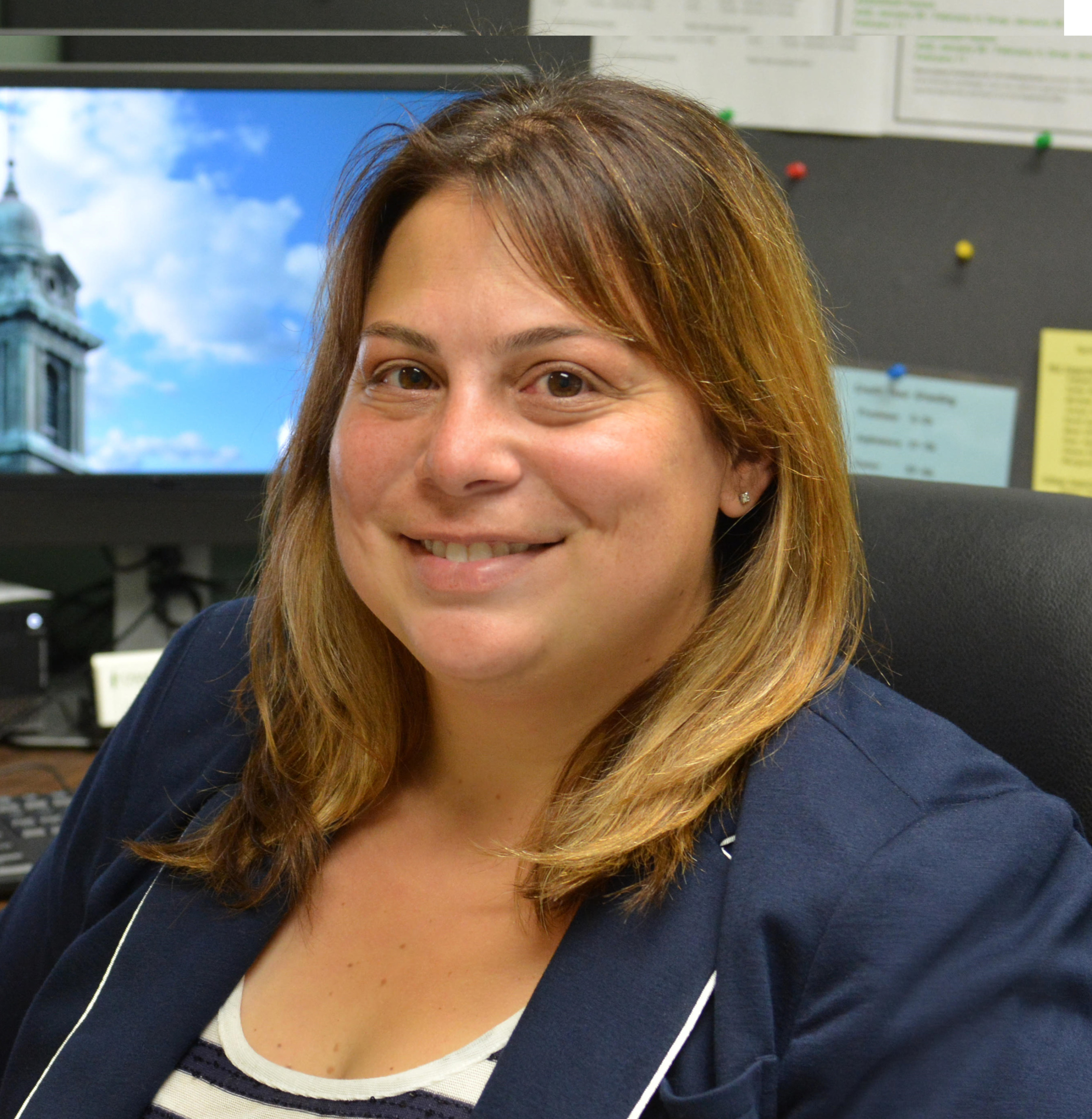 Active shooter drill: Headshot of Jaclyn Schildkraut woman with long, light brown hair in navy jacket with navy and white striped top