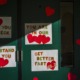 Teacher shot by 6-year-old student files $40 million lawsuit: messages with hearts on classroom door