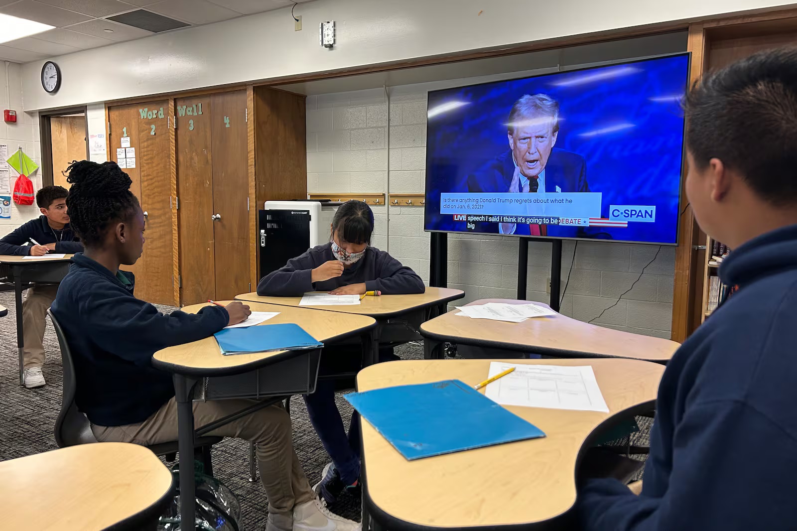 Teachers toss their lesson plans, give students the floor to grapple with election results, Trump win: classroom with Trump on TV