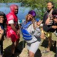 freedom schools: group of teens in lifejackets having fun at lake